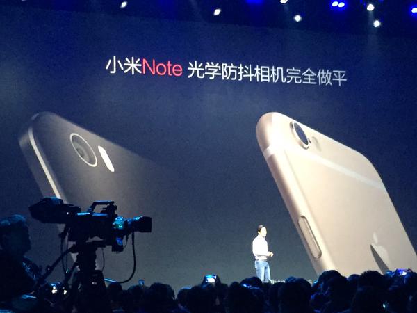 Lei Jun mocking the iPhone 6 Plus camera bump. 